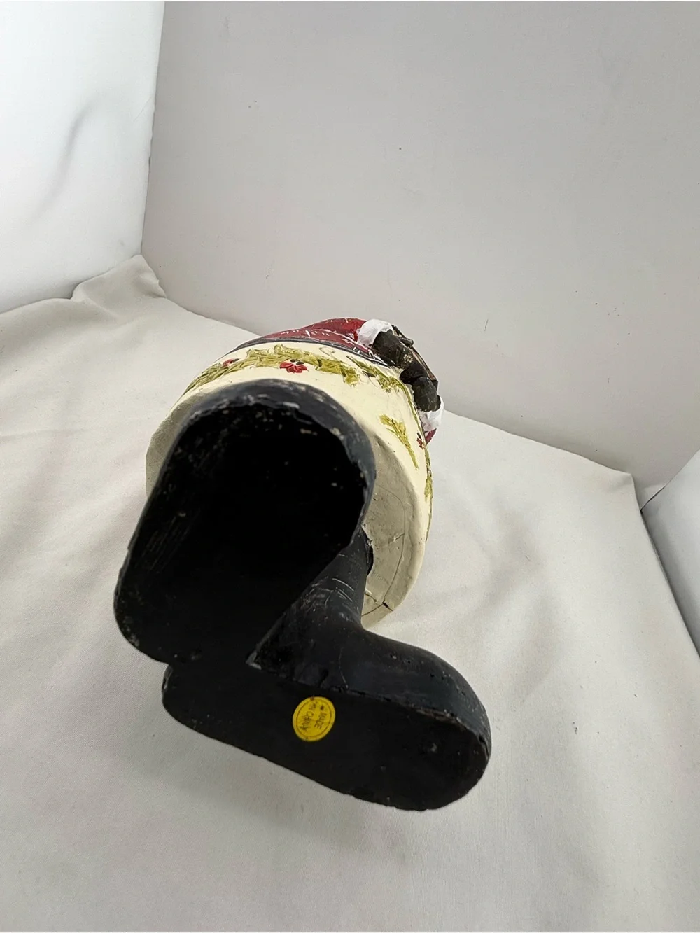 Folk art style resin Santa Claus figurine